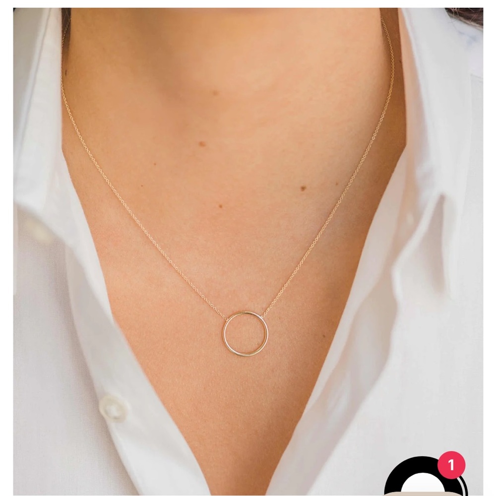 Beautiful 14k Gold necklace with an adjustable chain.